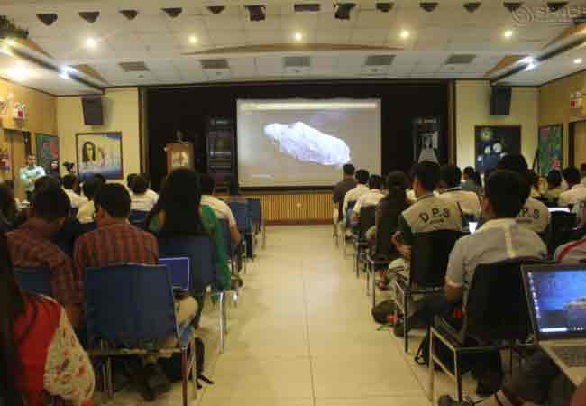 Students engaging in the study of asteroids