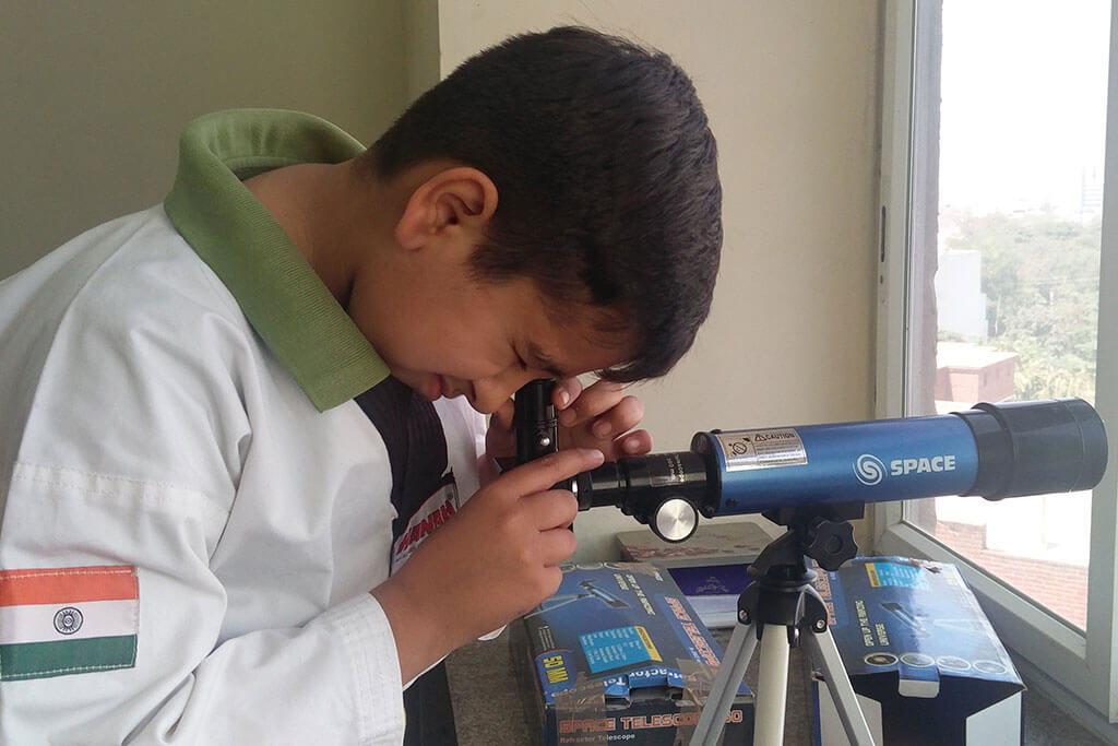 Students Doing Telescope Observation