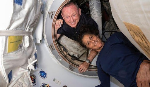 Butch Wilmore and Sunita Williams inside the vestibule between the forward port on the International Space Station's Harmony module and Boeing's Starliner spacecraft on June 13, 2024 NASA via AP