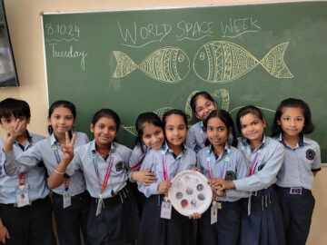 Students made solar system on the plate