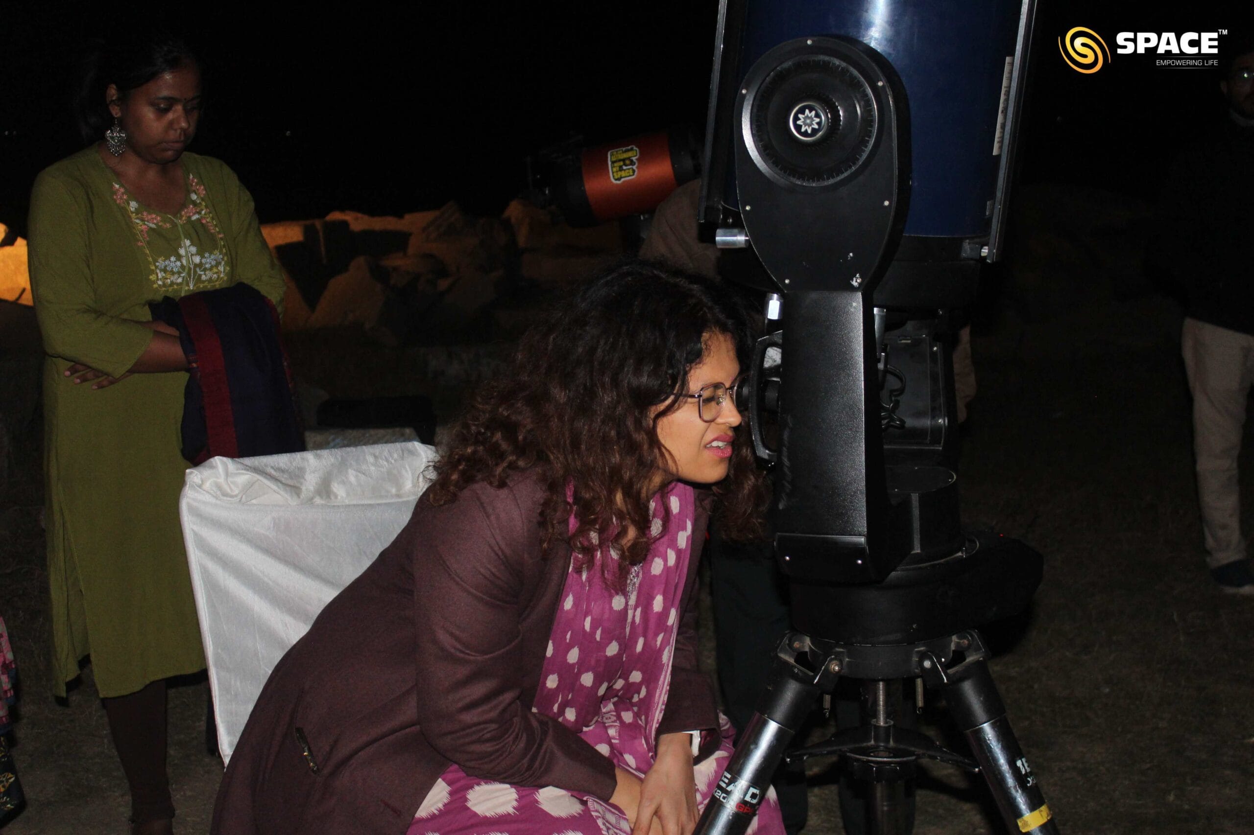 District Magistrate observing the night sky through telescopes at ANTARIKSH DARSHAN